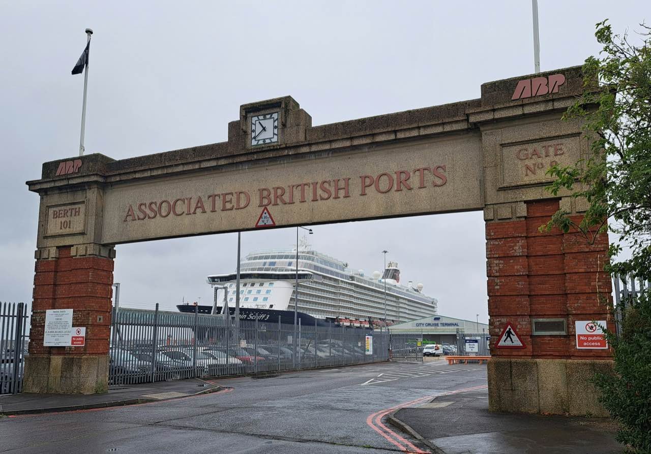 The Associated British Ports gate at Southampton docks, with a cruise ship berthed behind